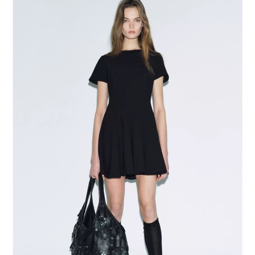 Chic Black Dress with Fringe Bag